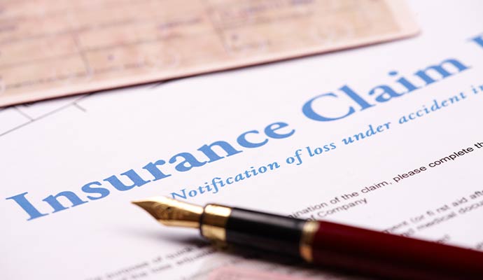 A close-up view of an insurance claim form